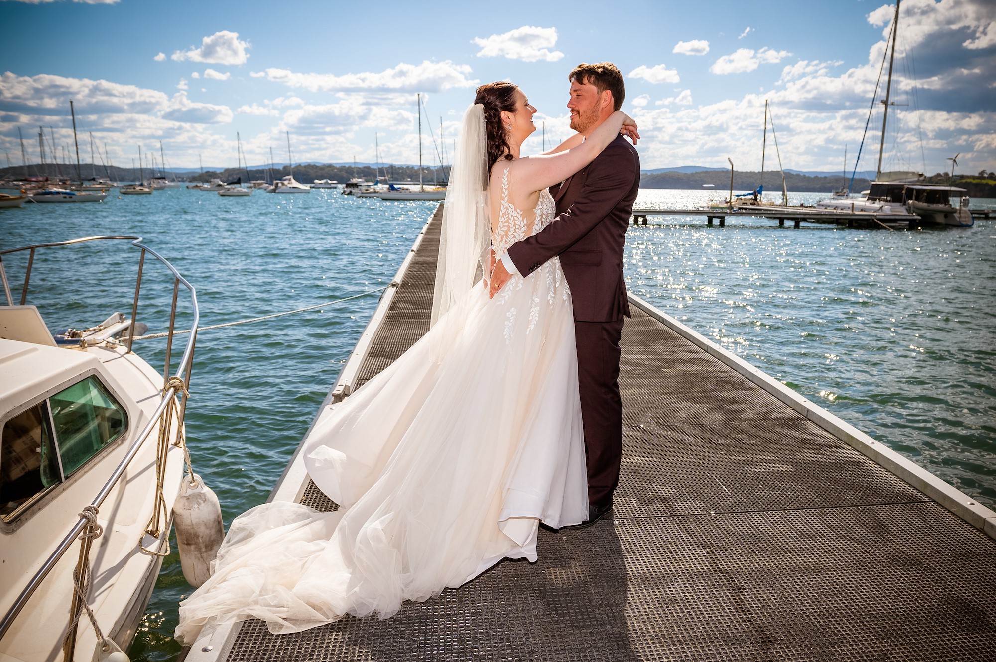 Julia and Shannon at Valentine Bowling Club on the shores of Lake Macquarie — a real Lake Macquarie wedding photographed by Newcastle wedding photographer John Adams